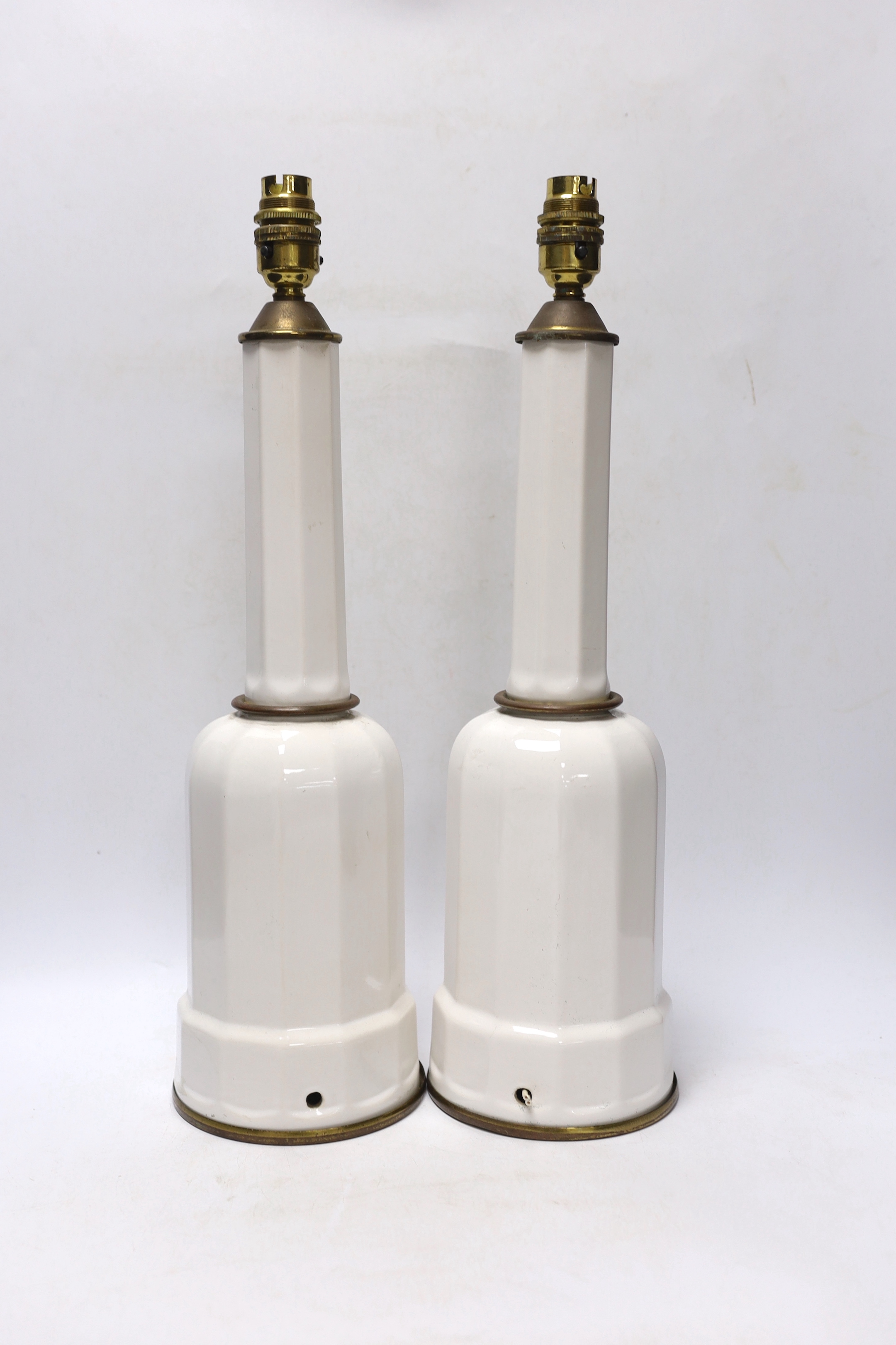 A pair of white glazed ceramic Heiberg lamps, 45cm